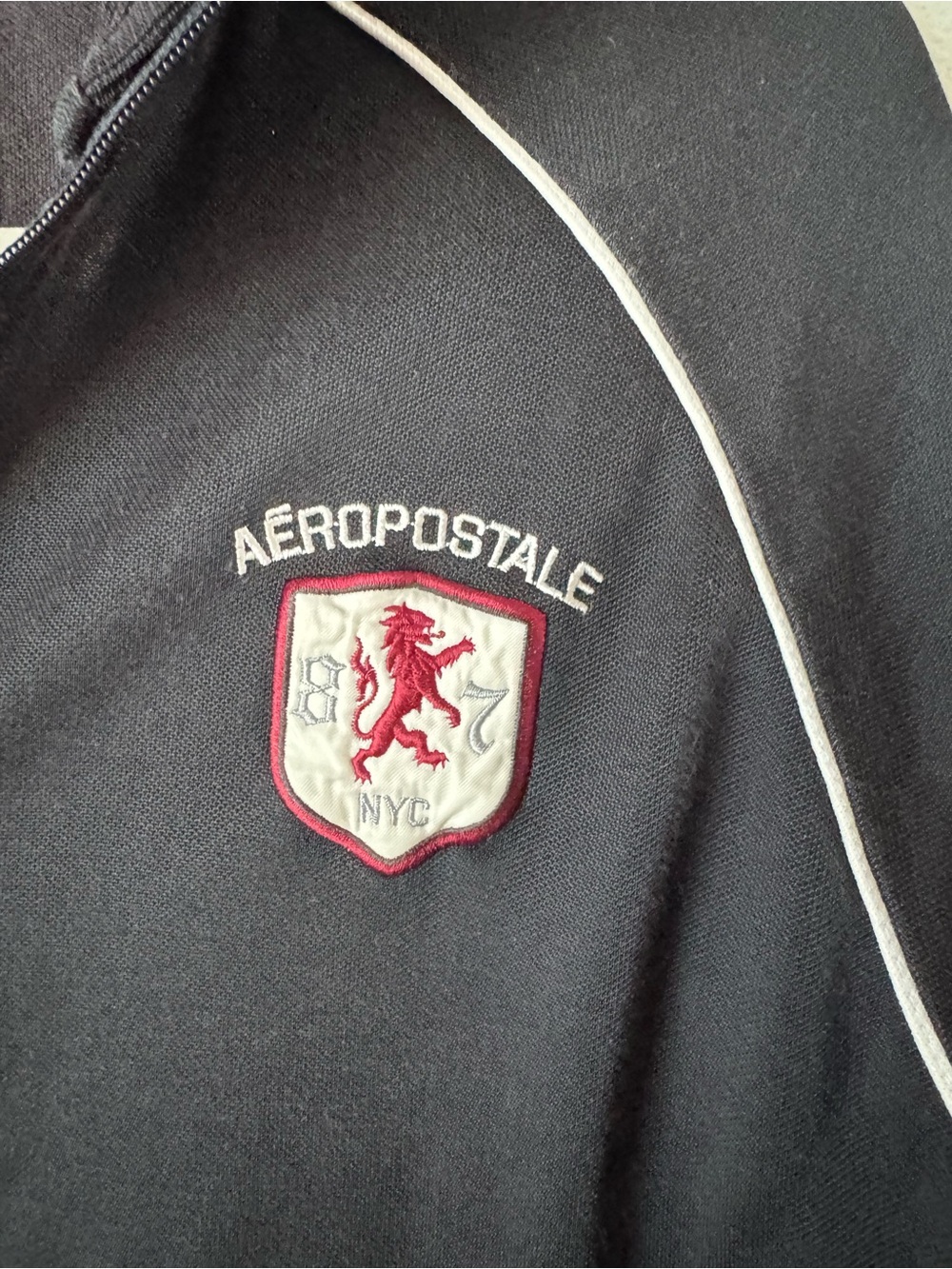 Y2K Aeropostale Black Zip with Crest Patch. Size L.